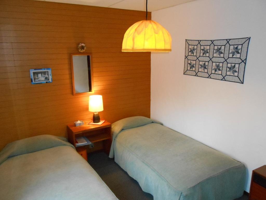 Pension Nugget Inn Hakuba Rom bilde