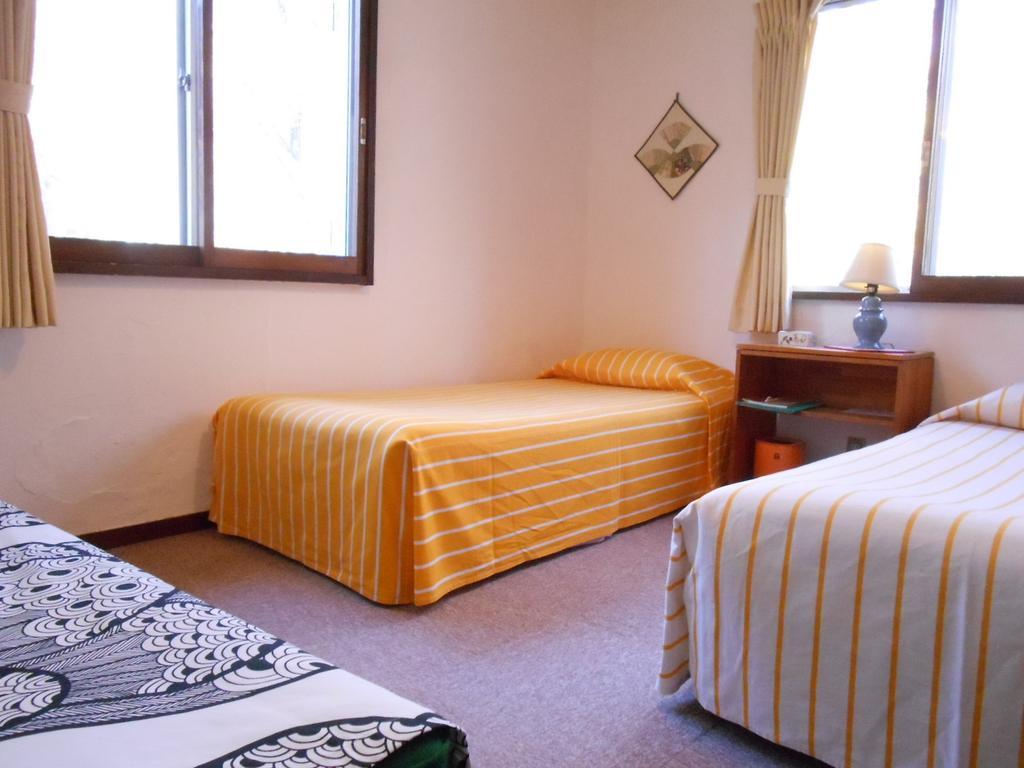 Pension Nugget Inn Hakuba Rom bilde